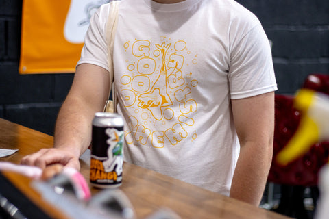 White Good Chem tshirt with yellow design on it